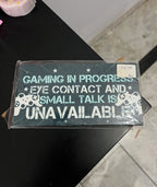 "Gaming in Progress" Sign Hanging