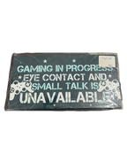 "Gaming in Progress" Sign Hanging