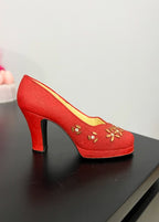 Red Heel Trinket